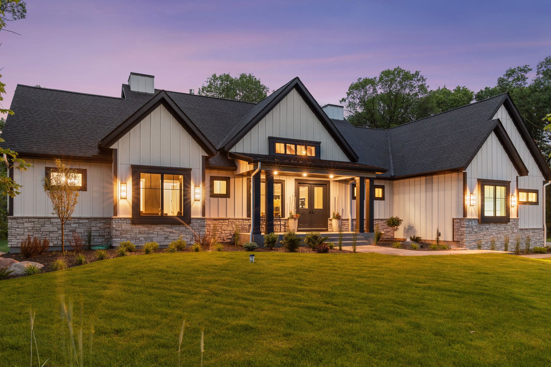 Home beautifully illuminated at dusk